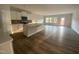 Open concept kitchen with island and stainless steel appliances at 5002 Cambrey Dr # 2, Durham, NC 27703