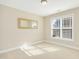 Well-lit bedroom with carpet and plenty of natural light at 506 Misty Willow Way, Rolesville, NC 27571