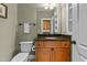 Elegant bathroom with granite vanity and updated fixtures at 5312 Landguard Dr, Raleigh, NC 27613