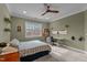 Bright bedroom with window seat and ceiling fan at 5312 Landguard Dr, Raleigh, NC 27613