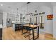 Modern kitchen featuring stainless steel appliances and white cabinetry at 5312 Landguard Dr, Raleigh, NC 27613