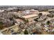 Wide aerial view of neighborhood and school at 624 Oakgrove Dr, Graham, NC 27253