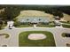 Beautiful clubhouse with well-manicured lawns and an inviting entrance, showcasing community amenities at 64 Barn Owl, Pittsboro, NC 27312