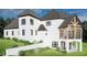 This home features a covered outdoor space on the main level, a large deck on the upper level and a sloping yard at 64 Barn Owl, Pittsboro, NC 27312