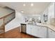 Modern kitchen with island and stainless steel appliances at 6422 Swatner Dr, Raleigh, NC 27612