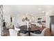 Dining area with a round table and chairs, adjacent to the kitchen at 6452 Alfalfa Ln, Wake Forest, NC 27587