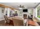 Living room with hardwood floors, fireplace, and view of kitchen at 741 C Isley Road, Haw River, NC 27258