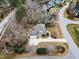 Aerial view of home with long driveway and mature landscaping at 7416 Capulin Crest Dr, Apex, NC 27539