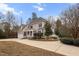 Charming two-story home with a long driveway and mature trees at 7416 Capulin Crest Dr, Apex, NC 27539