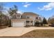 Beautiful two-story home featuring an attached two-car garage at 7416 Capulin Crest Dr, Apex, NC 27539