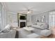 Inviting living room with fireplace, built-in shelving, neutral paint, and plush seating for relaxation at 7416 Capulin Crest Dr, Apex, NC 27539