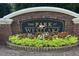 Elegant community sign for The Park at Westlake, featuring lush floral landscaping at 7416 Capulin Crest Dr, Apex, NC 27539
