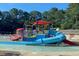 Exciting splash pad with vibrant play structures and shallow water features for  at 7416 Capulin Crest Dr, Apex, NC 27539