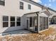 House exterior with screened porch and partial view of the neighborhood at 800 Summit Crest Ct, Apex, NC 27523