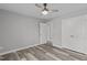 Bedroom with ceiling fan and wood-look floors at 1 Cates Ct, Hillsborough, NC 27278