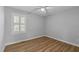 Simple bedroom with wood flooring and ceiling fan at 1014 Holden Rd Rd, Youngsville, NC 27596