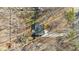 Aerial view of the home showing the property's layout and surrounding trees at 1014 Holden Rd, Youngsville, NC 27596