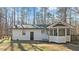 Home with a screened porch and door to the backyard at 1014 Holden Rd, Youngsville, NC 27596