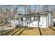 Charming exterior view of a renovated bungalow with a covered porch and neat landscaping at 1014 Holden Rd, Youngsville, NC 27596