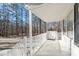 Inviting front porch with white railings and ample space for relaxing at 1014 Holden Rd, Youngsville, NC 27596