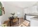 Modern kitchen with white cabinets and stainless steel appliances at 1039 W Murray Ave, Durham, NC 27704