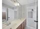 Double vanity bathroom with view of bedroom at 109 Aspenridge Dr, Holly Springs, NC 27540