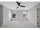 Spacious bedroom with neutral walls, ceiling fan and carpet at 109 Aspenridge Dr, Holly Springs, NC 27540