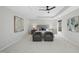 Spacious bedroom with carpeted floors and ceiling fan at 109 Aspenridge Dr, Holly Springs, NC 27540