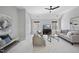 Bright bonus room with comfortable seating and large windows at 109 Aspenridge Dr, Holly Springs, NC 27540