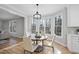 Kitchen breakfast nook with a round table and three chairs at 109 Aspenridge Dr, Holly Springs, NC 27540