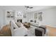 Spacious living room features a fireplace and built-in shelving at 109 Aspenridge Dr, Holly Springs, NC 27540