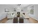 Spacious living room features a fireplace and built-in shelving at 109 Aspenridge Dr, Holly Springs, NC 27540