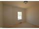 Bedroom featuring a window and neutral walls at 1105 Opal Ln # 70, Durham, NC 27705
