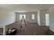 Unfurnished bedroom with neutral walls, two windows providing natural light and carpeted floors at 1105 Opal Ln # 70, Durham, NC 27705