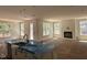 Open concept kitchen with a farmhouse sink and view into the living room and fireplace at 1105 Opal Ln # 70, Durham, NC 27705