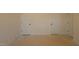 A room with unfinished floors and two doors at 1105 Opal Ln # 70, Durham, NC 27705