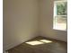 A bright room with hardwood floors and a window at 1105 Opal Ln # 70, Durham, NC 27705