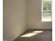 A room with hardwood floors and a window at 1105 Opal Ln # 70, Durham, NC 27705