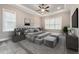 Spacious bedroom with large windows and plush carpeting at 1205 Smith Creek Way, Wake Forest, NC 27587