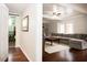 Spacious basement with L-shape sofa and hardwood floor at 128 Bruce Dr, Cary, NC 27511
