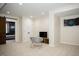Finished basement with a TV and dartboard at 128 Bruce Dr, Cary, NC 27511