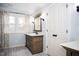 Bathroom with double vanities and plenty of storage space at 128 Bruce Dr, Cary, NC 27511