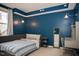 Bedroom with a bed, desk, and blue walls at 128 Bruce Dr, Cary, NC 27511