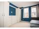 Bedroom with built-in dresser and window at 128 Bruce Dr, Cary, NC 27511