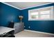 Bright bedroom with a dresser and window at 128 Bruce Dr, Cary, NC 27511