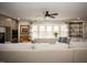 Spacious living room featuring a cozy fireplace and large windows at 128 Bruce Dr, Cary, NC 27511