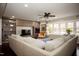 Large living room with sectional sofa and stone fireplace at 128 Bruce Dr, Cary, NC 27511