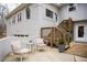 Relaxing patio with comfortable seating and potted plants at 128 Bruce Dr, Cary, NC 27511
