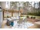Spacious patio with seating area and patterned rug at 128 Bruce Dr, Cary, NC 27511