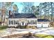 Charming ranch home with attached two-car garage and landscaped yard at 130 Twin Oaks Dr, Durham, NC 27712